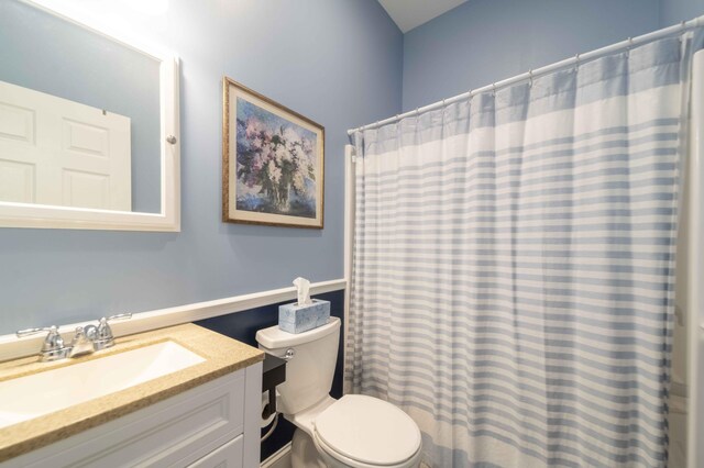 5 Whiffletree Cir, Sandwich, MA 02563 - full bathroom featuring toilet, vanity, and curtained shower