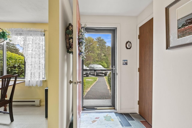 146 Crescent Ln, Brewster, MA 02631 - entryway featuring a baseboard radiator and baseboards
