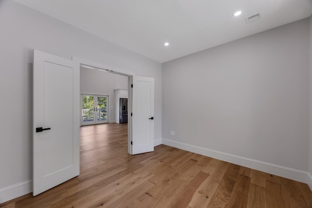 84 Hooppole Rd, Mashpee, MA 02649 - spare room featuring baseboards, light wood-type flooring, and recessed lighting