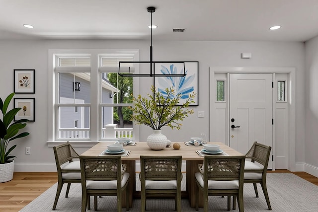 84 Hooppole Rd, Mashpee, MA 02649 - dining room featuring wood finished floors, baseboards, a chandelier, and recessed lighting