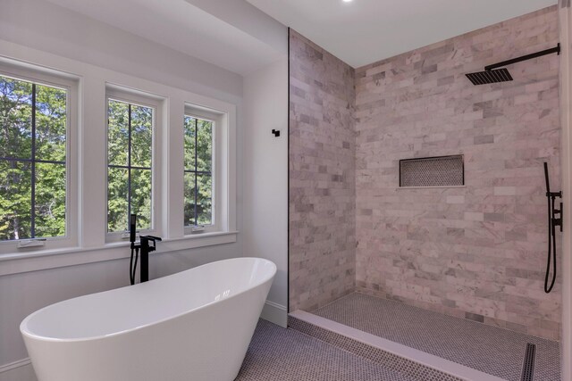 84 Hooppole Rd, Mashpee, MA 02649 - full bath featuring a tile shower, plenty of natural light, a freestanding bath, and tile patterned floors