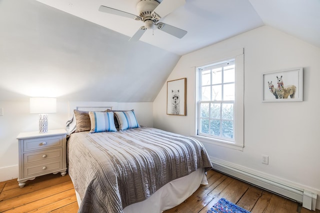 bedroom featuring ceiling fan, vaulted ceiling, a baseboard radiator, and light wood-type flooring