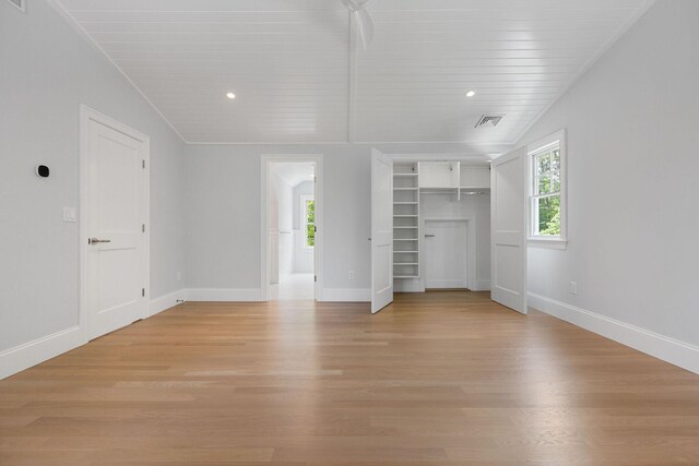 9 Joy Ln, Orleans, MA 02653 - unfurnished bedroom with multiple windows, light wood-type flooring, baseboards, and recessed lighting