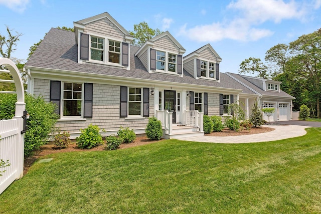 9 Joy Ln, Orleans, MA 02653 - shingle-style home with a front yard, asphalt driveway, and roof with shingles
