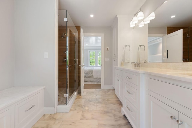 9 Joy Ln, Orleans, MA 02653 - full bathroom with vanity, a shower stall, marble look tile flooring, baseboards, and recessed lighting