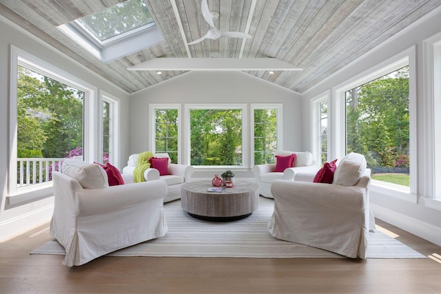 9 Joy Ln, Orleans, MA 02653 - sunroom / solarium featuring a skylight, wood ceiling, baseboards, and wood finished floors