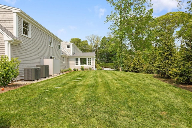 9 Joy Ln, Orleans, MA 02653 - view of green lawn featuring central AC unit