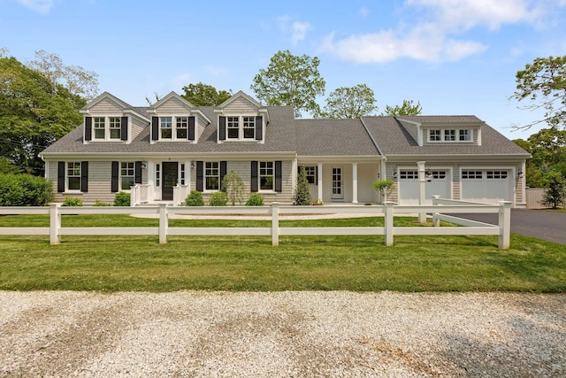 9 Joy Ln, Orleans, MA 02653 - shingle-style home featuring driveway, roof with shingles, and a garage