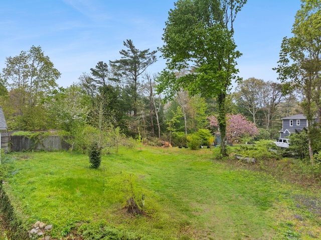 view of yard with fence