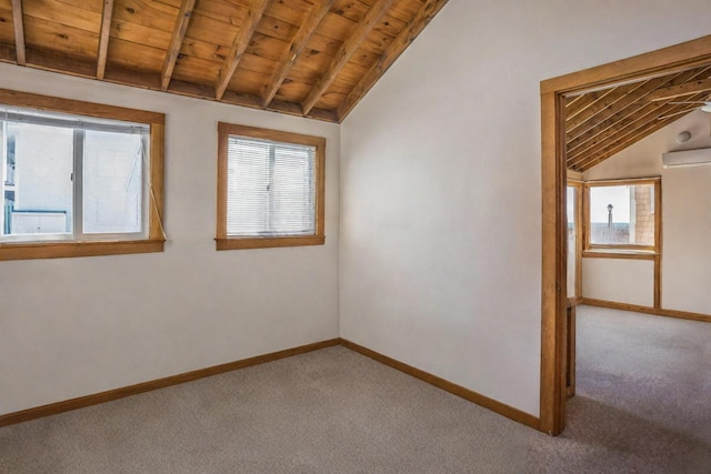 unfurnished room with wooden ceiling, a wall mounted AC, lofted ceiling with beams, and carpet floors