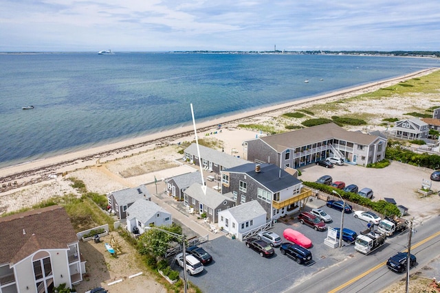 aerial view featuring a water view and a view of the beach