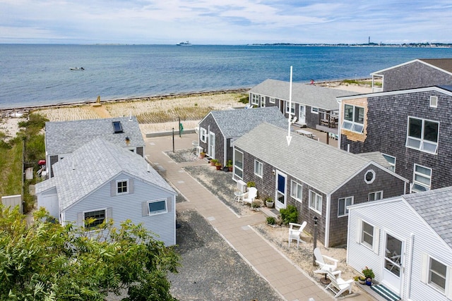 bird's eye view featuring a beach view and a water view