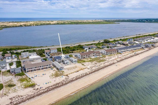 aerial view featuring a water view and a view of the beach