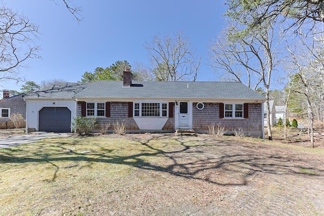 261 Old Chatham Rd, South Dennis, MA 02660 - single story home featuring entry steps, an attached garage, a chimney, concrete driveway, and a front lawn
