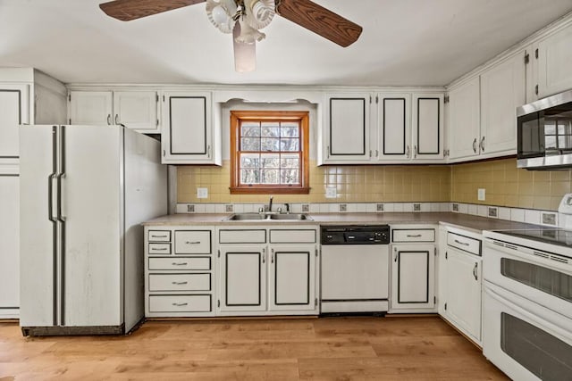 261 Old Chatham Rd, South Dennis, MA 02660 - kitchen with white appliances, a sink, backsplash, and ceiling fan