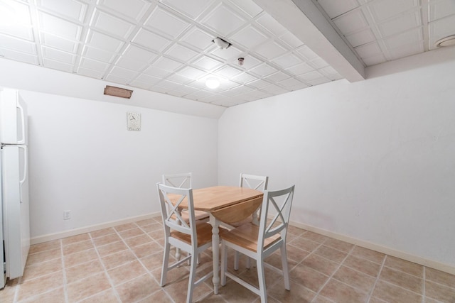 181 Leisure Green Dr, Mashpee, MA 02649 - dining area with baseboards and light tile patterned floors