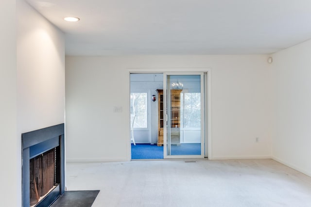181 Leisure Green Dr, Mashpee, MA 02649 - unfurnished living room featuring carpet floors and baseboards