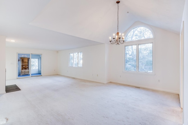 181 Leisure Green Dr, Mashpee, MA 02649 - empty room with a chandelier, light carpet, lofted ceiling, and baseboards
