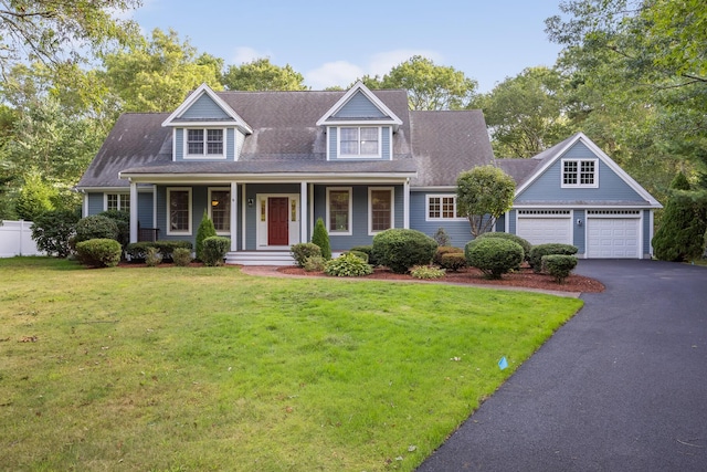 view of front of home featuring a front lawn and a porch