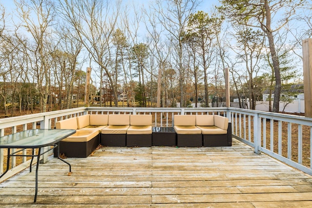 deck featuring outdoor lounge area