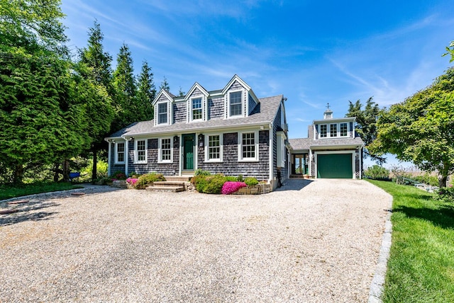 40 Thacher Shore Rd, Yarmouth Port, MA 02675 - view of front of house with driveway and an attached garage