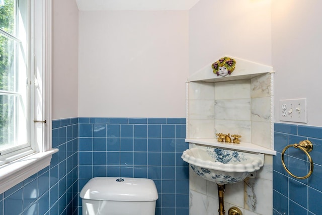 40 Thacher Shore Rd, Yarmouth Port, MA 02675 - bathroom featuring tile walls, a wainscoted wall, and toilet