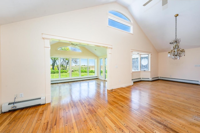 40 Thacher Shore Rd, Yarmouth Port, MA 02675 - unfurnished living room with ceiling fan, baseboard heating, a chandelier, a baseboard heating unit, and light wood-type flooring