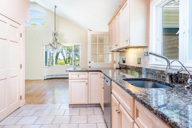 40 Thacher Shore Rd, Yarmouth Port, MA 02675 - kitchen featuring a sink, stainless steel dishwasher, a chandelier, a baseboard heating unit, and healthy amount of natural light