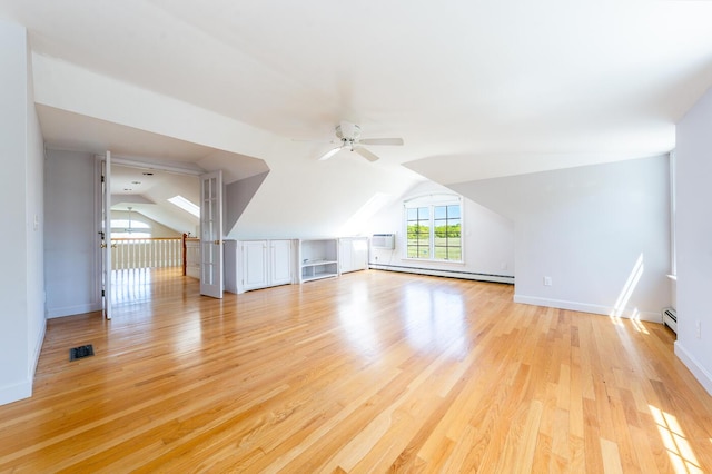 40 Thacher Shore Rd, Yarmouth Port, MA 02675 - bonus room featuring ceiling fan, vaulted ceiling, a baseboard heating unit, light wood finished floors, and a wall unit AC