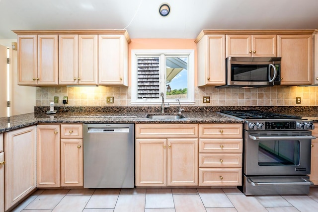 40 Thacher Shore Rd, Yarmouth Port, MA 02675 - kitchen with appliances with stainless steel finishes, a sink, light brown cabinets, and tasteful backsplash