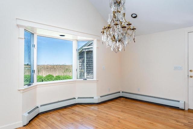 40 Thacher Shore Rd, Yarmouth Port, MA 02675 - empty room featuring a chandelier, lofted ceiling, and light wood finished floors