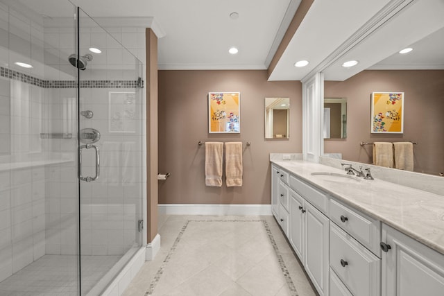 bathroom with baseboards, recessed lighting, vanity, a stall shower, and ornamental molding