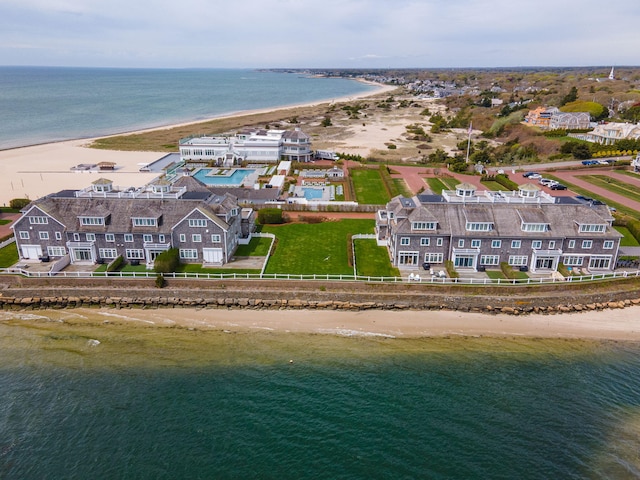 aerial view of waterfront with a beach
