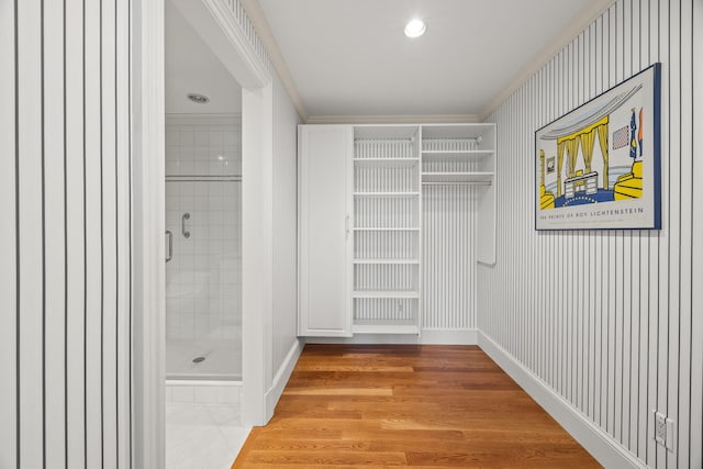 spacious closet with light wood-style floors