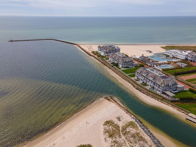 bird's eye view of waterfront with a beach