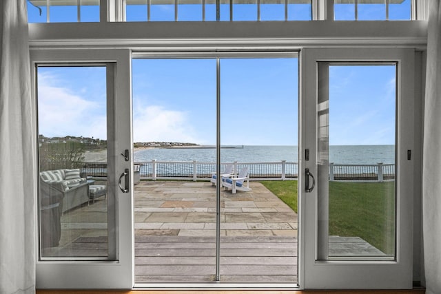 entryway featuring a water view