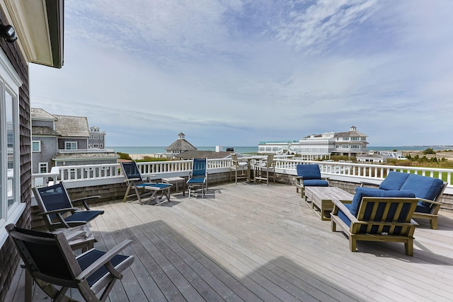 wooden terrace with a water view