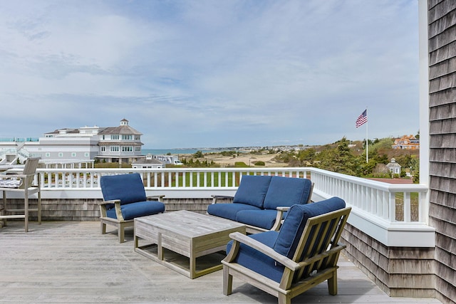 wooden deck with outdoor lounge area