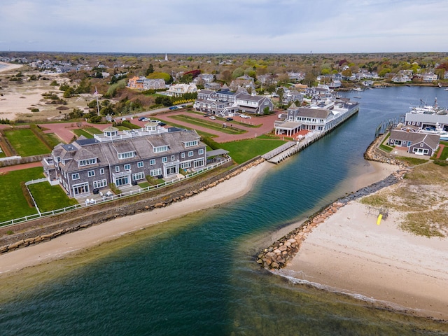 drone / aerial view of waterfront with a beach