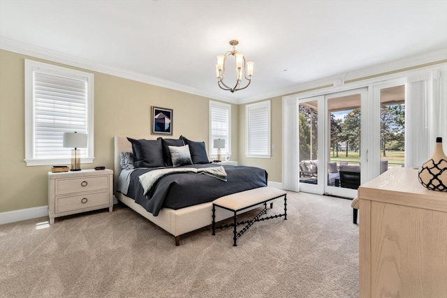 66 Simons Rd Unit A, Mashpee, MA 02649 - bedroom featuring light carpet, access to outside, crown molding, and a chandelier