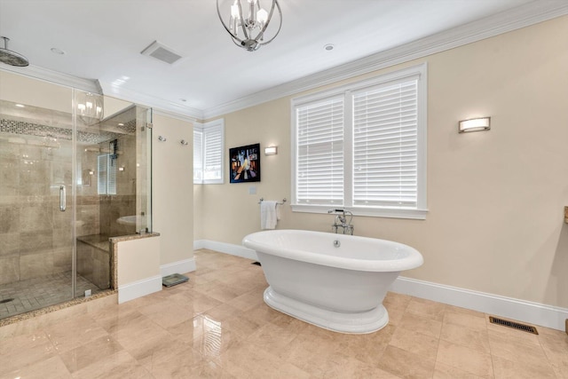 66 Simons Rd Unit A, Mashpee, MA 02649 - full bathroom featuring crown molding, a stall shower, a freestanding bath, a chandelier, and tile patterned floors