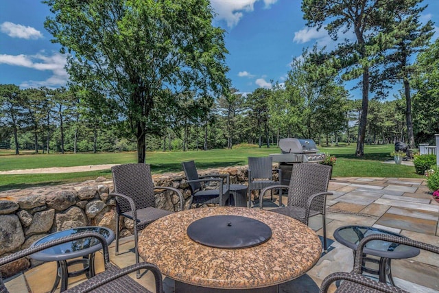 66 Simons Rd Unit A, Mashpee, MA 02649 - view of patio / terrace featuring view of wooded area