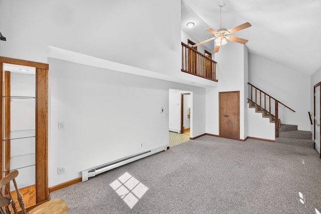 153 Blackthorn Rd, Marstons Mills, MA 02648 - unfurnished living room featuring a baseboard radiator, carpet floors, stairway, high vaulted ceiling, and a ceiling fan