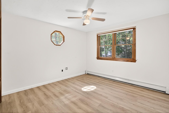 153 Blackthorn Rd, Marstons Mills, MA 02648 - empty room featuring plenty of natural light, baseboard heating, light wood-style flooring, and ceiling fan