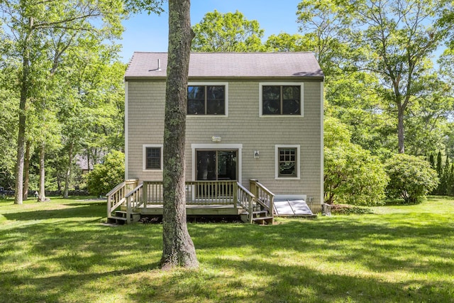 153 Blackthorn Rd, Marstons Mills, MA 02648 - rear view of property featuring a wooden deck, a yard, and a shingled roof