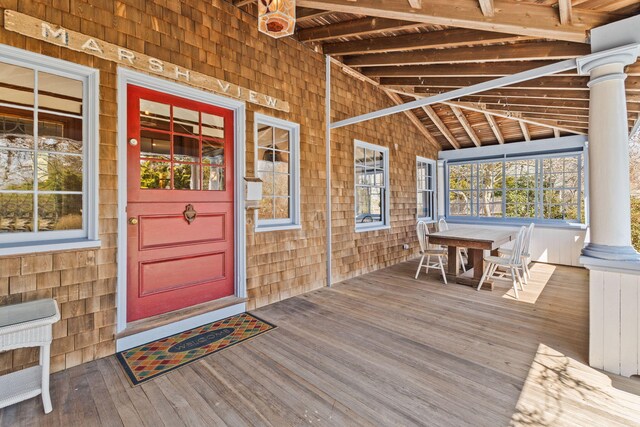 10 Quissett Ave, Woods Hole, MA 02543 - wooden porch featuring outdoor dining space