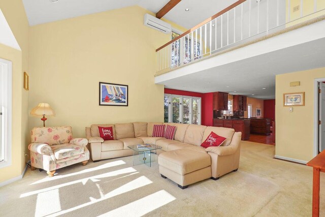 carpeted living room featuring high vaulted ceiling, beamed ceiling, and an AC wall unit