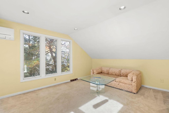 bonus room featuring vaulted ceiling, a wall mounted AC, and light carpet