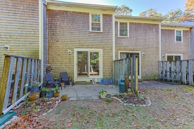 back of house with a patio area