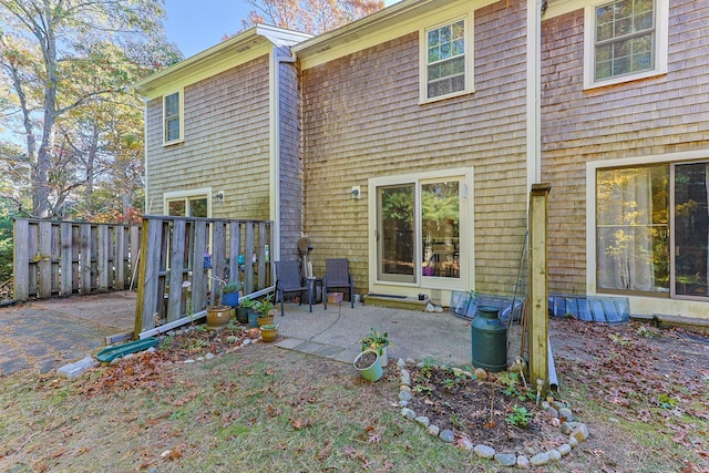 rear view of house with a patio